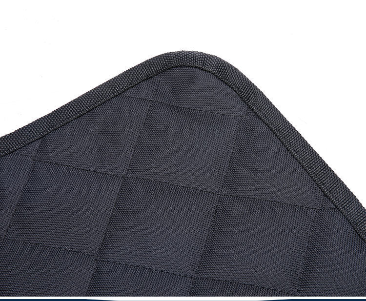 Dog sitting in car seat hammock cover with mesh window