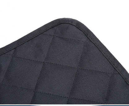 Dog sitting in car seat hammock cover with mesh window