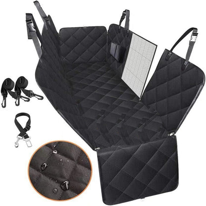 Dog sitting in car seat hammock cover with mesh window